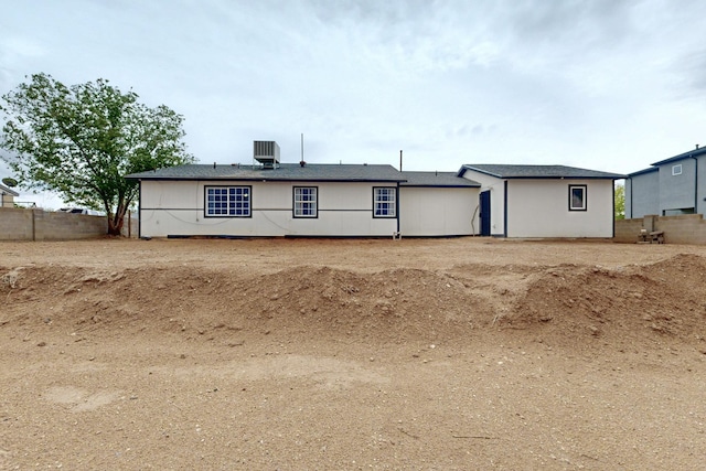 404 Pecos Loop SE, Rio Rancho, NM 87124 - back of house featuring central AC unit
