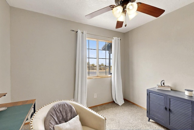 404 Pecos Loop SE, Rio Rancho, NM 87124 - living area featuring ceiling fan, baseboards, and light carpet