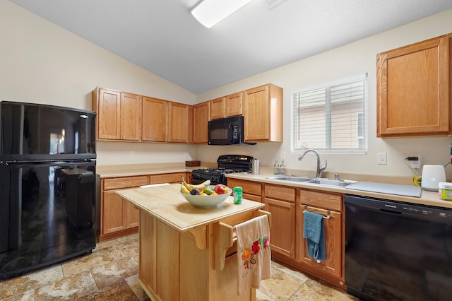 3772 Havasu Falls St NE, Rio Rancho, NM 87144 - kitchen featuring black appliances, a sink, vaulted ceiling, light stone finish floors, and a kitchen island