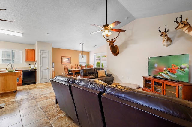 3772 Havasu Falls St NE, Rio Rancho, NM 87144 - living room featuring vaulted ceiling, ceiling fan, and a textured ceiling