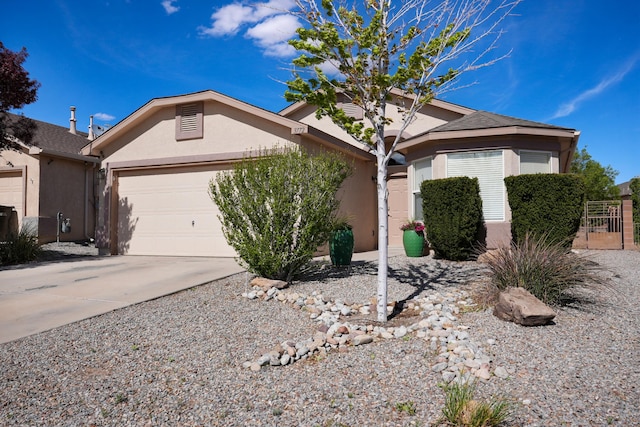 3772 Havasu Falls St NE, Rio Rancho, NM 87144 - ranch-style home featuring stucco siding, an attached garage, and driveway