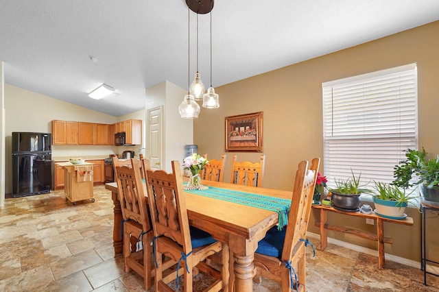 3772 Havasu Falls St NE, Rio Rancho, NM 87144 - dining space with lofted ceiling and light stone finish floors