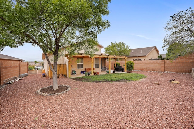 3772 Havasu Falls St NE, Rio Rancho, NM 87144 - rear view of property featuring stucco siding, a fenced backyard, and a patio area