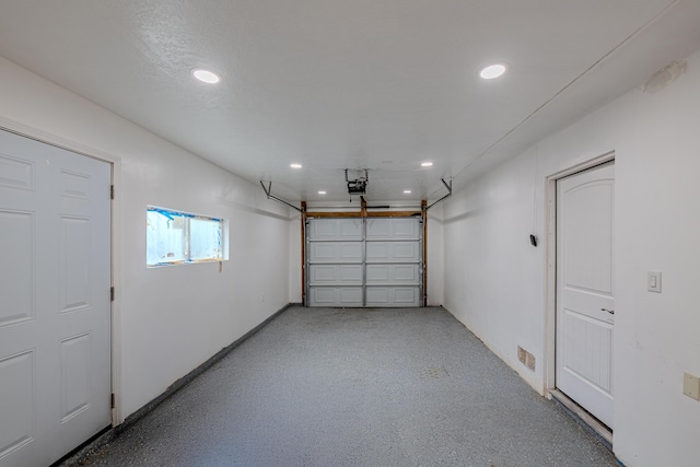 15161/2 Gallegos Rd SW, Albuquerque, NM 87105 - garage with recessed lighting and a garage door opener