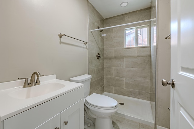 15161/2 Gallegos Rd SW, Albuquerque, NM 87105 - bathroom featuring tiled shower, vanity, toilet, and tile patterned flooring