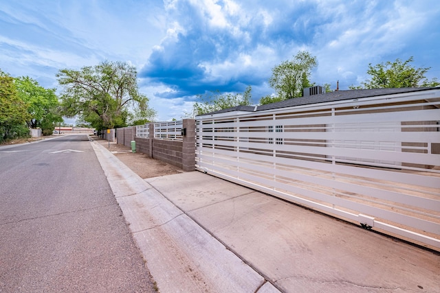 15161/2 Gallegos Rd SW, Albuquerque, NM 87105 - view of asphalt road with a gate