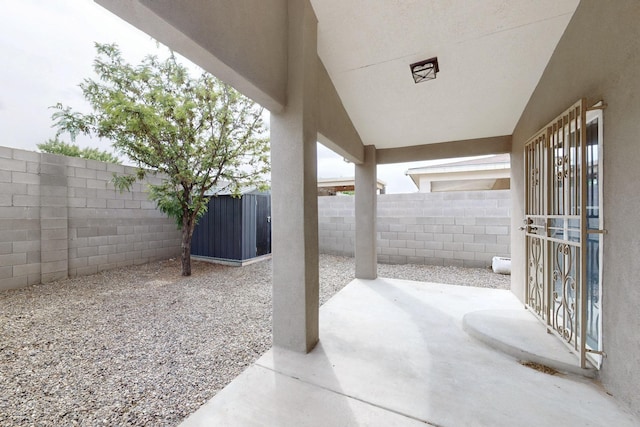8912 Silverado Ave SW, Albuquerque, NM 87121 - view of patio with a fenced backyard