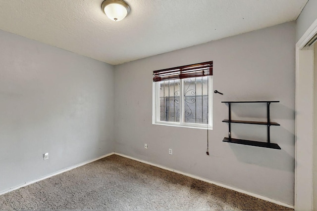 8912 Silverado Ave SW, Albuquerque, NM 87121 - spare room featuring carpet flooring and baseboards