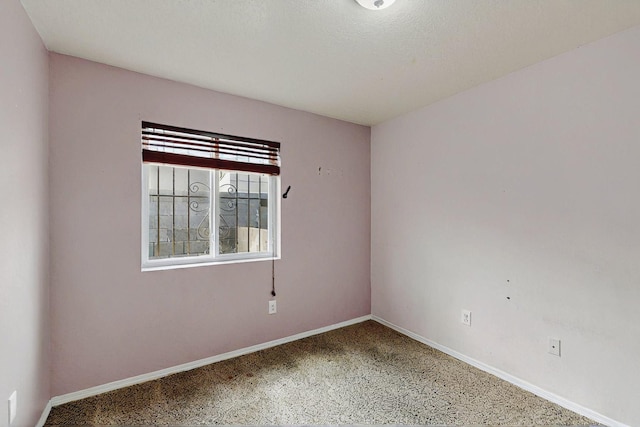8912 Silverado Ave SW, Albuquerque, NM 87121 - spare room with baseboards