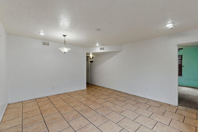 8912 Silverado Ave SW, Albuquerque, NM 87121 - unfurnished room featuring a textured ceiling and recessed lighting
