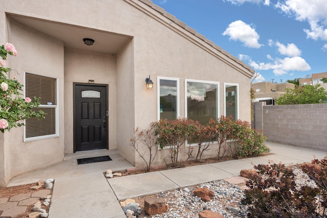 4700 Crestridge Ave NW, Albuquerque, NM 87114 - view of exterior entry featuring stucco siding