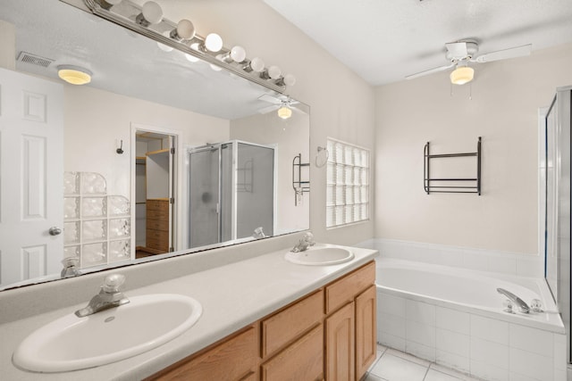 4700 Crestridge Ave NW, Albuquerque, NM 87114 - full bath featuring a ceiling fan, a shower stall, a garden tub, and double vanity