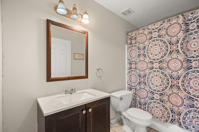 4700 Crestridge Ave NW, Albuquerque, NM 87114 - bathroom featuring vanity, toilet, curtained shower, tile patterned flooring, and a textured ceiling