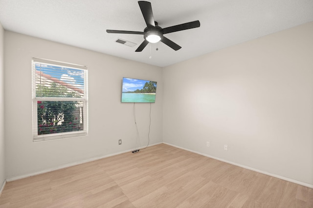 4700 Crestridge Ave NW, Albuquerque, NM 87114 - empty room with light wood-style floors, ceiling fan, and baseboards