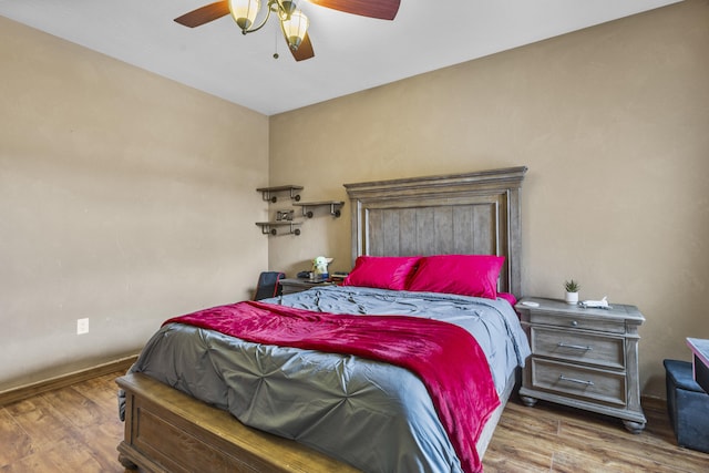 4613 Croyden Ave NW, Albuquerque, NM 87114 - bedroom with wood finished floors, baseboards, and a ceiling fan