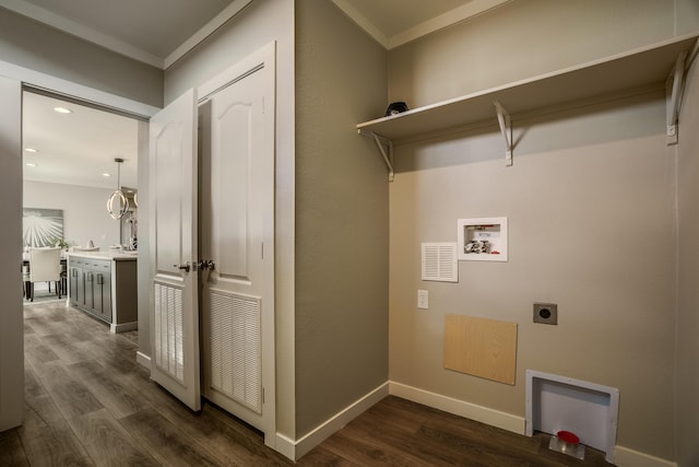 1899 Vargas Rd SE, Rio Rancho, NM 87124 - clothes washing area with electric dryer hookup, washer hookup, dark wood-style flooring, baseboards, and ornamental molding
