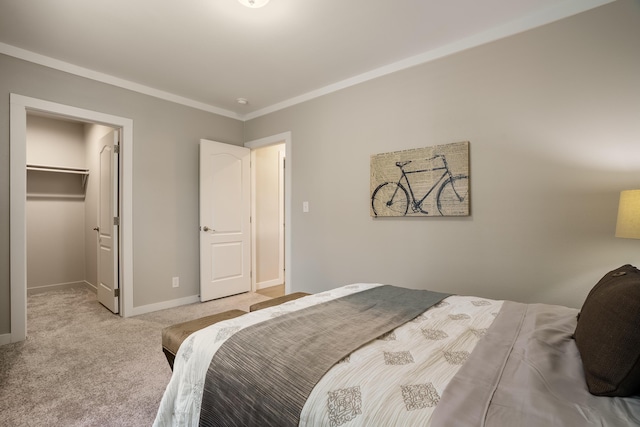 1899 Vargas Rd SE, Rio Rancho, NM 87124 - bedroom featuring a spacious closet, carpet, baseboards, and crown molding
