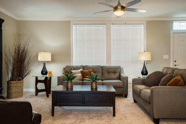 1899 Vargas Rd SE, Rio Rancho, NM 87124 - living area featuring a ceiling fan, light colored carpet, baseboards, and ornamental molding