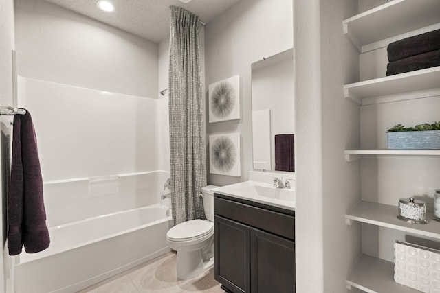 bathroom featuring toilet, shower / bath combination with curtain, vanity, and tile patterned flooring