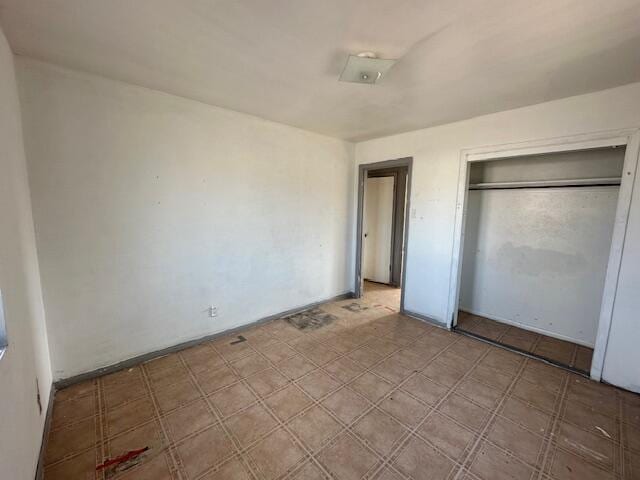 1205 Del Norte Blvd, Grants, NM 87020 - unfurnished bedroom featuring a closet