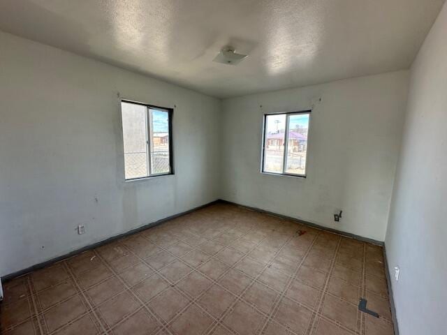 1205 Del Norte Blvd, Grants, NM 87020 - unfurnished room featuring plenty of natural light