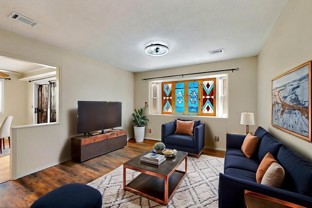 5721 Miller Rd NE, Rio Rancho, NM 87144 - living area featuring wood finished floors and baseboards