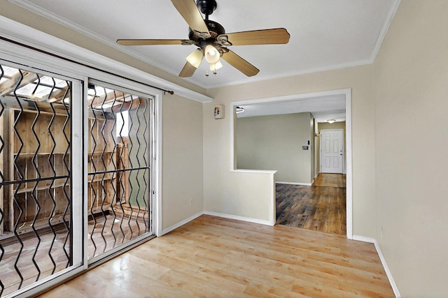 5721 Miller Rd NE, Rio Rancho, NM 87144 - unfurnished room featuring wood finished floors, baseboards, ornamental molding, and a ceiling fan