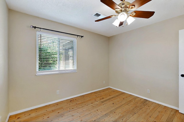 5721 Miller Rd NE, Rio Rancho, NM 87144 - unfurnished room with wood-type flooring, baseboards, and a ceiling fan