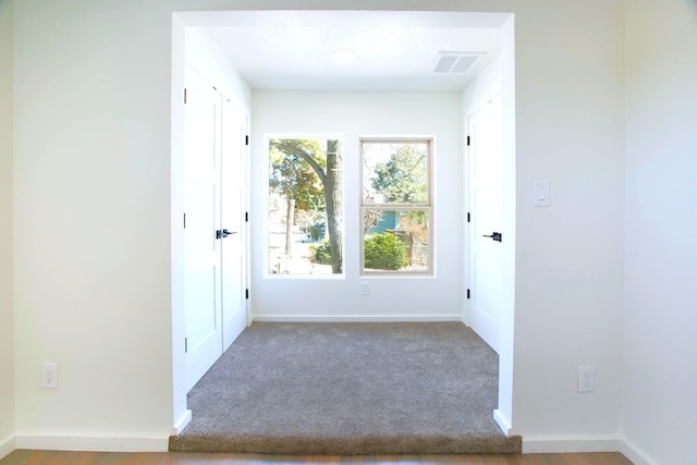 445 Rim Rd, Los Alamos, NM 87544 - carpeted empty room featuring baseboards