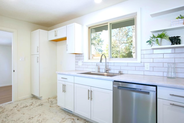445 Rim Rd, Los Alamos, NM 87544 - kitchen featuring stainless steel dishwasher, a sink, backsplash, white cabinetry, and open shelves
