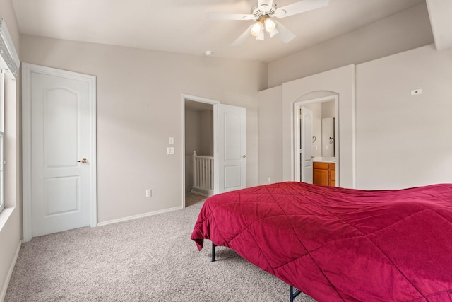 5236 Na Pali St NE, Albuquerque, NM 87111 - bedroom featuring carpet flooring, baseboards, connected bathroom, lofted ceiling, and ceiling fan