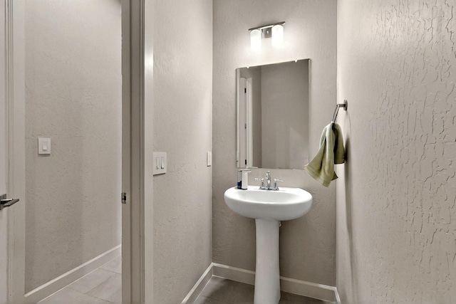 3406 Falkirk Rd NE, Rio Rancho, NM 87144 - bathroom featuring a sink and tile patterned floors