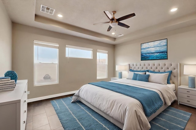 3406 Falkirk Rd NE, Rio Rancho, NM 87144 - bedroom with a raised ceiling, recessed lighting, baseboards, and a ceiling fan