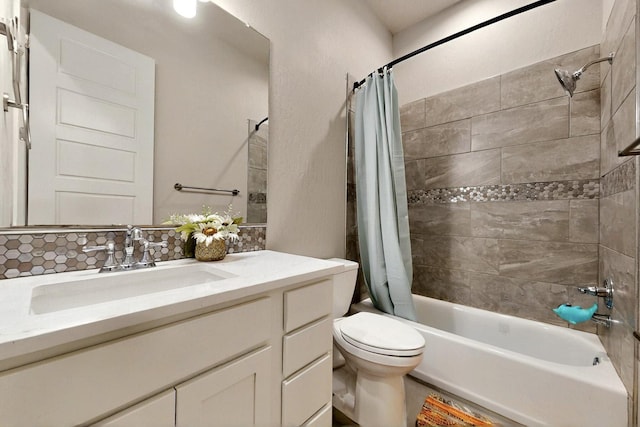 3406 Falkirk Rd NE, Rio Rancho, NM 87144 - bathroom with toilet, shower / bath combo with shower curtain, vanity, and decorative backsplash