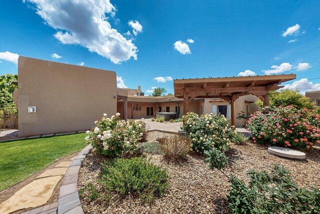 4700 Quaker Heights Pl NW, Albuquerque, NM 87120 - rear view of property featuring stucco siding