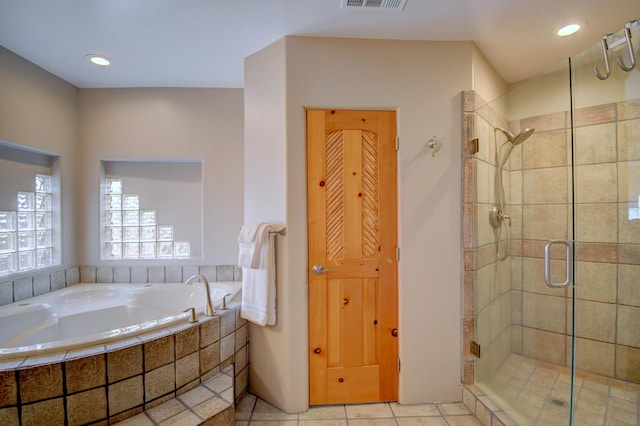 4700 Quaker Heights Pl NW, Albuquerque, NM 87120 - bathroom with a stall shower, a garden tub, tile patterned flooring, and recessed lighting