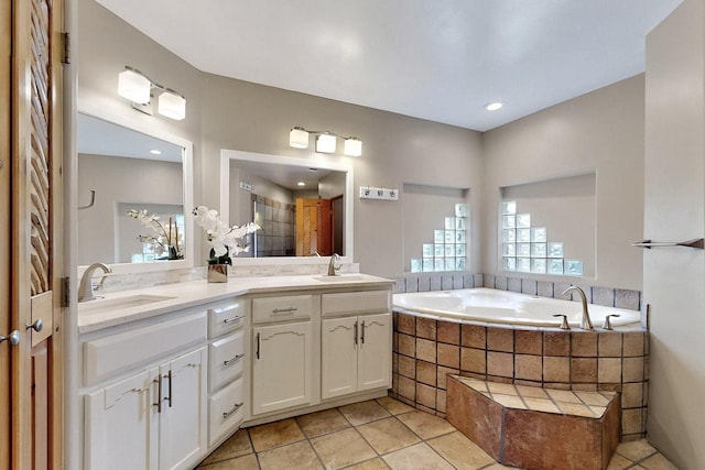 4700 Quaker Heights Pl NW, Albuquerque, NM 87120 - full bath featuring a bath, tile patterned floors, and double vanity