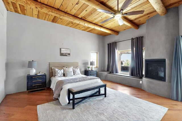4700 Quaker Heights Pl NW, Albuquerque, NM 87120 - bedroom with wood ceiling, beamed ceiling, and wood finished floors