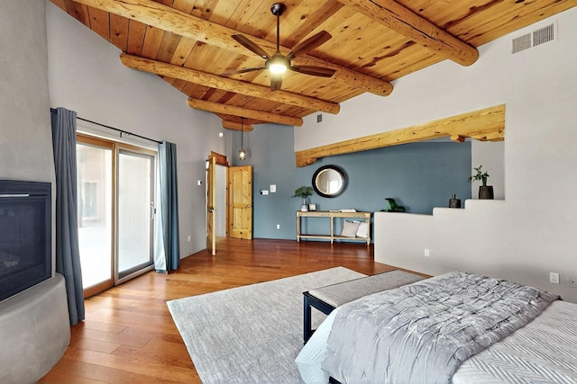 4700 Quaker Heights Pl NW, Albuquerque, NM 87120 - bedroom featuring wooden ceiling, access to exterior, wood finished floors, and beamed ceiling