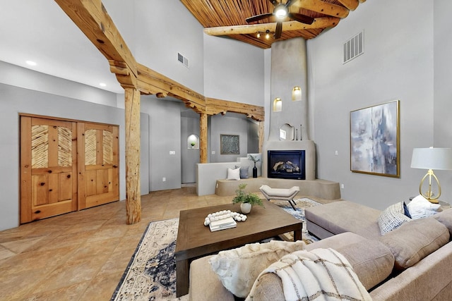 4700 Quaker Heights Pl NW, Albuquerque, NM 87120 - living room with a high ceiling, ceiling fan, wood ceiling, recessed lighting, and beam ceiling