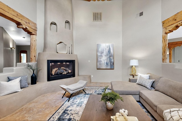 4700 Quaker Heights Pl NW, Albuquerque, NM 87120 - living area with a high ceiling and a large fireplace