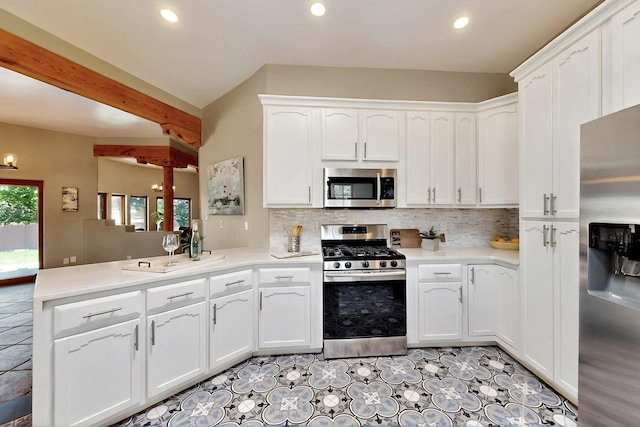 4700 Quaker Heights Pl NW, Albuquerque, NM 87120 - kitchen featuring stainless steel appliances, white cabinetry, decorative backsplash, light countertops, and recessed lighting