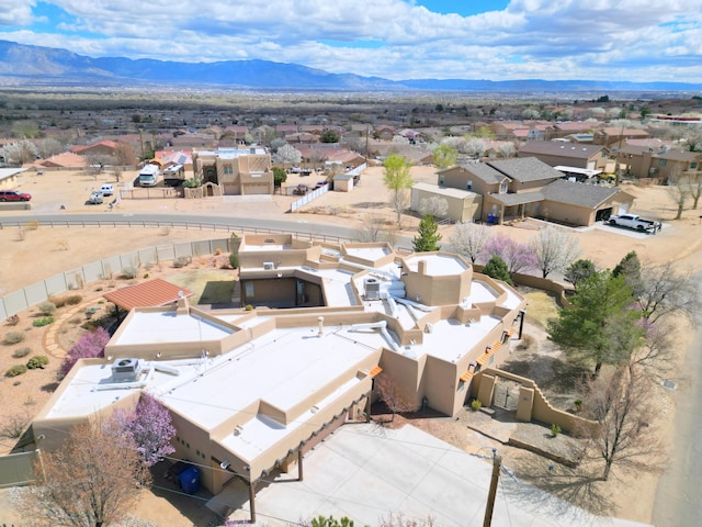 4700 Quaker Heights Pl NW, Albuquerque, NM 87120 - aerial perspective of suburban area featuring a mountainous background