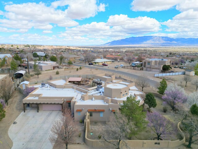 4700 Quaker Heights Pl NW, Albuquerque, NM 87120 - aerial perspective of suburban area with mountains