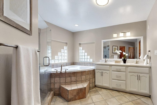 4700 Quaker Heights Pl NW, Albuquerque, NM 87120 - full bathroom featuring a stall shower, tile patterned flooring, a bath, and double vanity