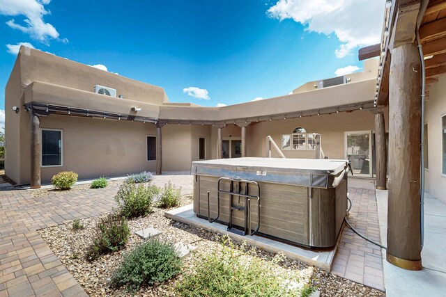 4700 Quaker Heights Pl NW, Albuquerque, NM 87120 - view of patio / terrace with a hot tub