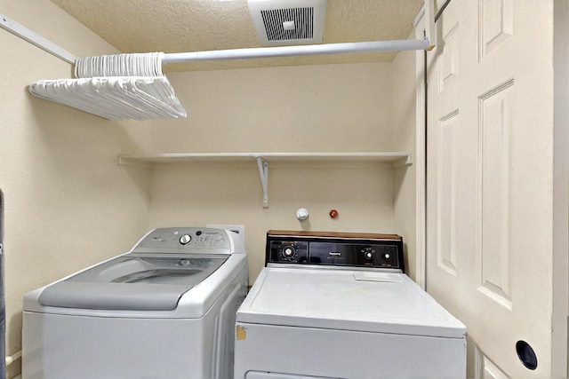 10912 Saltillo St NW, Albuquerque, NM 87114 - clothes washing area featuring independent washer and dryer