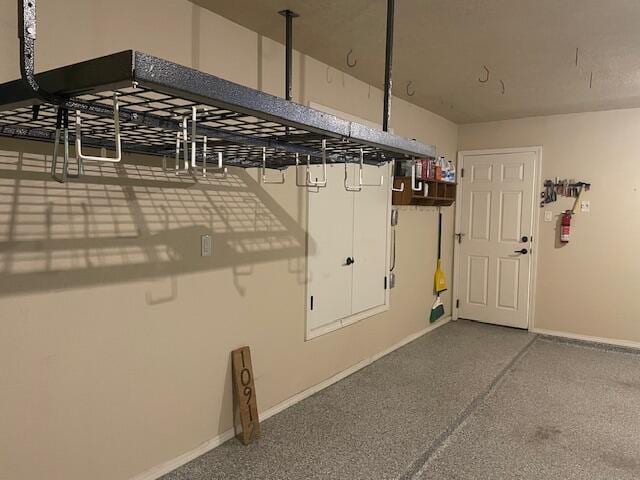 10912 Saltillo St NW, Albuquerque, NM 87114 - garage with baseboards