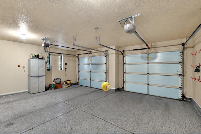 10912 Saltillo St NW, Albuquerque, NM 87114 - garage featuring a garage door opener and baseboards