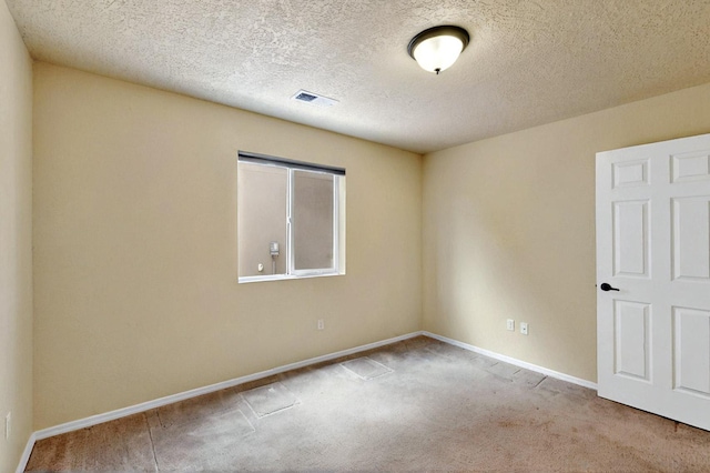 10912 Saltillo St NW, Albuquerque, NM 87114 - carpeted spare room featuring baseboards and a textured ceiling